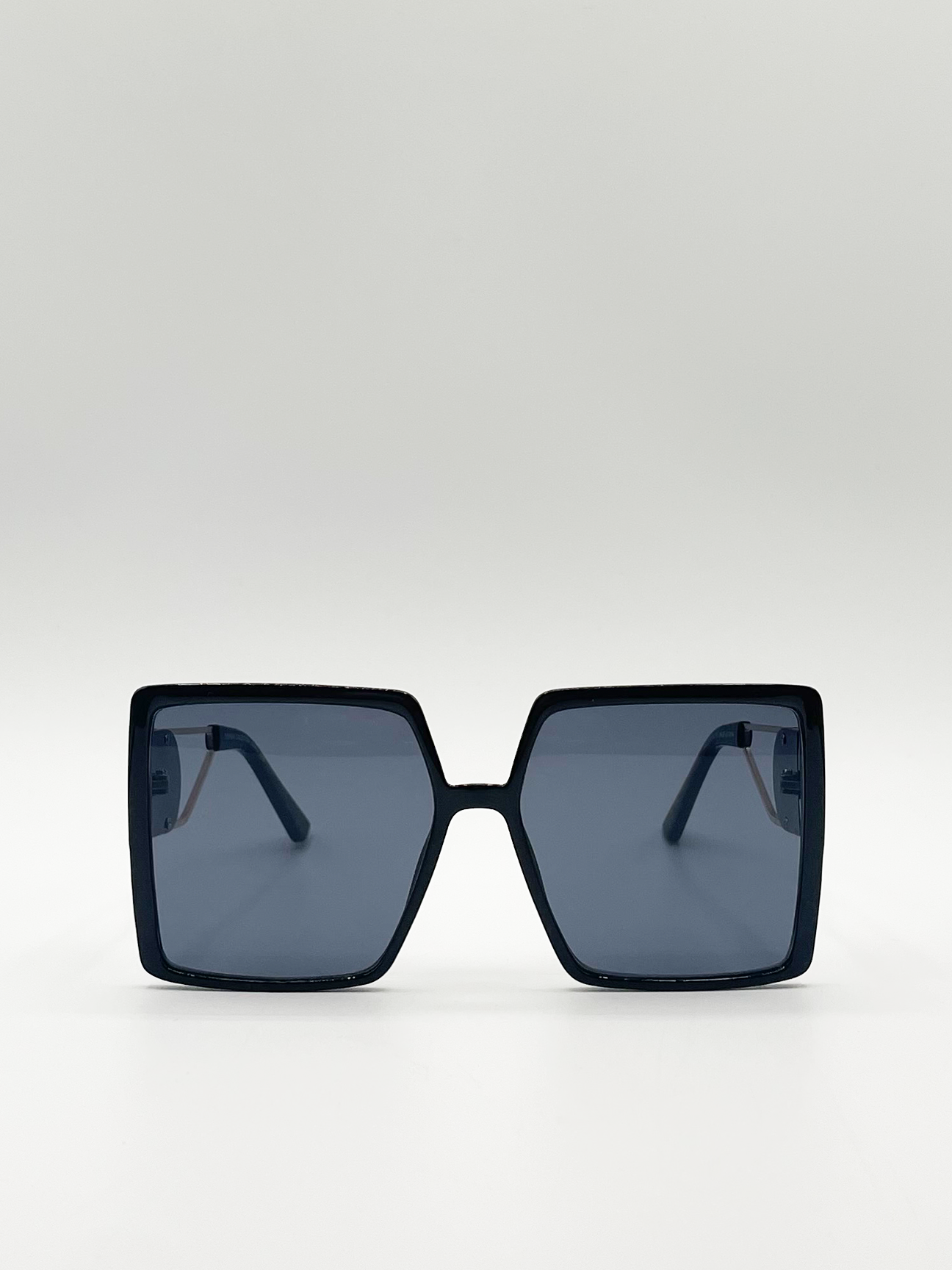 Oversized square sunglasses with temple frame detail