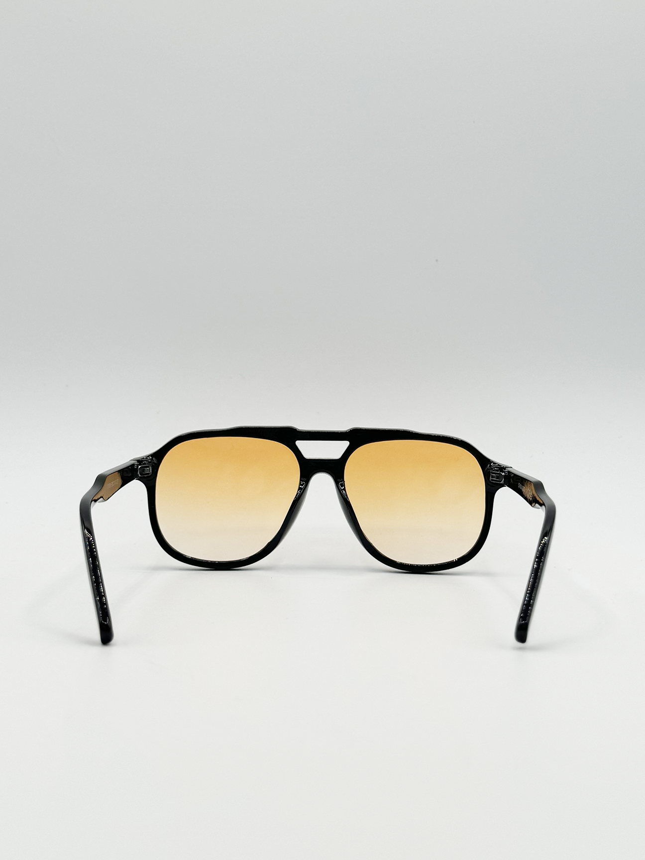 Oversized Navigator Sunglasses in Black with Orange Lenses