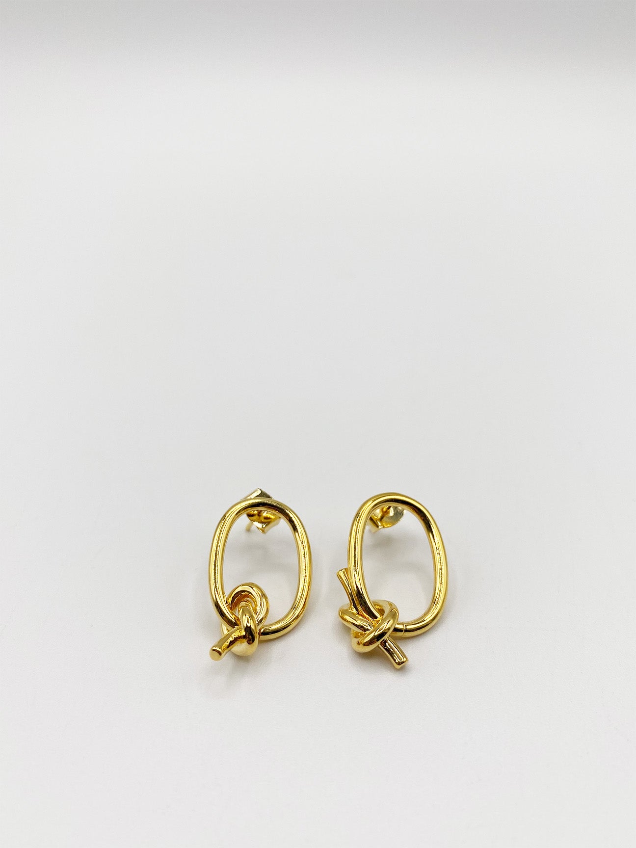 Gold Plated Earrings With Knot Detail