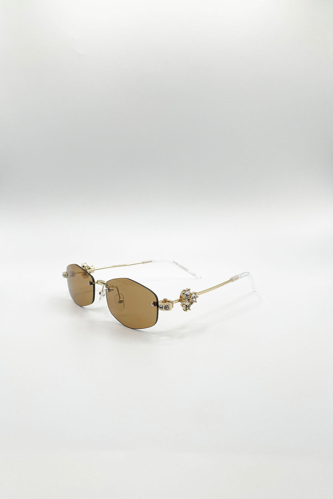 Rimless Oval Diamante Sunglasses In Brown